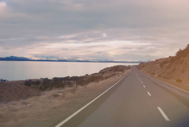 istock Scenic Winter Road in Landscape 1157279747