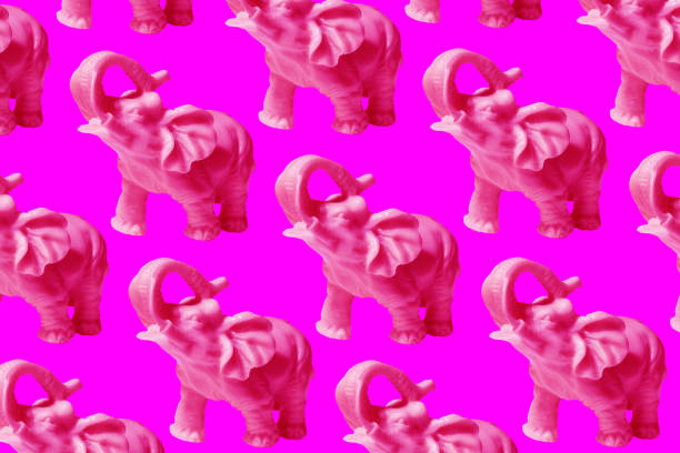 pattern of isolated pink elephants on an even color background