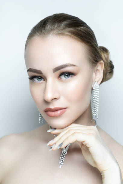 istock woman stylish trendy make up 1157285583