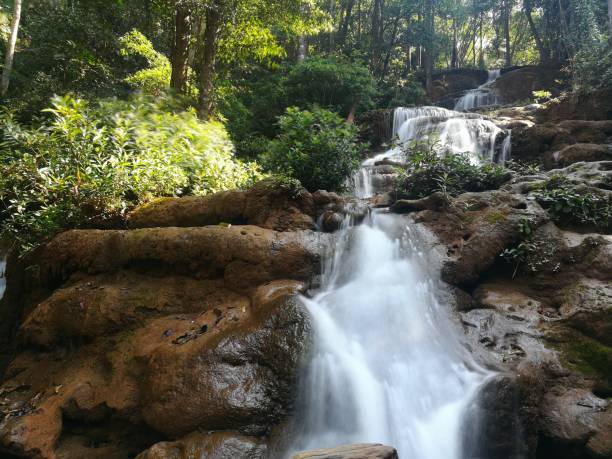 istock beautiful natural waterfalls in the thailand 1157285754