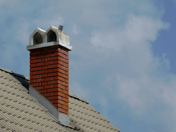 istock retro style brick chimney with ornamental white concrete cap stone 1157285895
