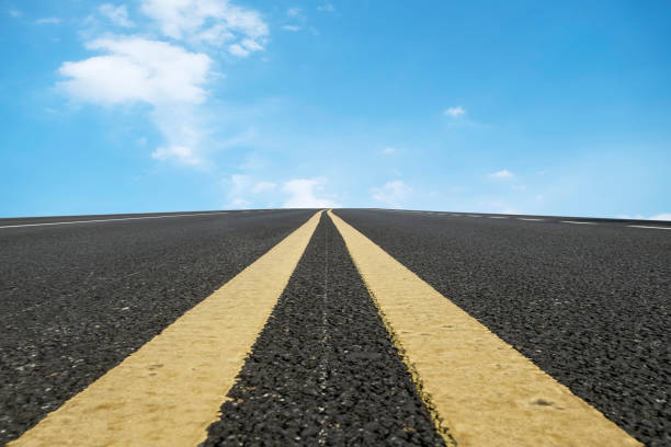 istock Road surface and sky landscape 1157288118