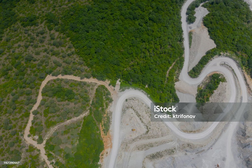 Aerial View Of Stone Quarry And Road In Mountain Aerial View Of Stone Quarry And Road In Mountain, Gelendzhik, Russia Metal Ore Stock Photo