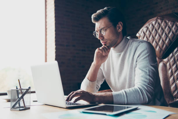 istock Profile side view portrait of nice attractive content remote assistant partner consultant self-employed freelance preparing presentation at industrial loft brick style interior work place station 1157293099