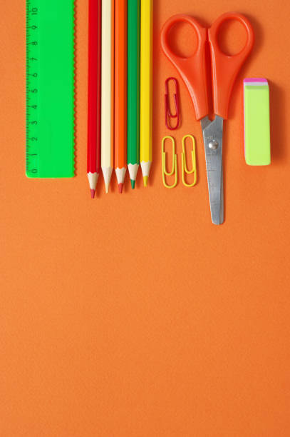 istock Colorful stationery set on orange 1157294541