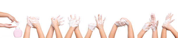 ragazza asiatica lavaggio a mano isolato su sfondo bianco. - antibacterial washing hands washing hygiene foto e immagini stock