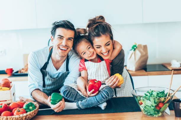 istock Happy family in the kitchen 1157304067