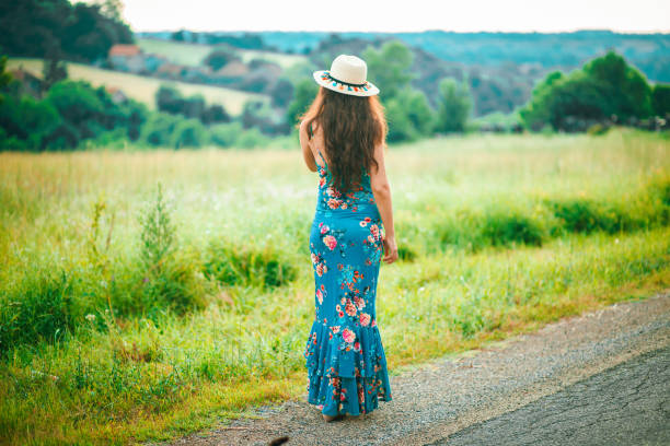 istock Girl in park smiling 1157310202