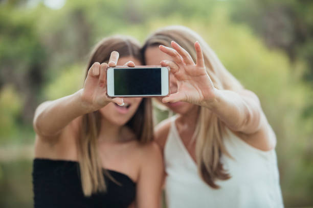 istock Mother and Daughter Capturing Memories 1157314924