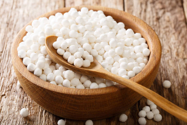 istock Heap of tapioca pearls close-up in a bowl on a table. horizontal 1157316564