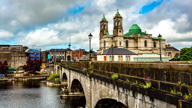 Beautiful view of the city of Athlone with its bridge over the river Shannon, the parish church of Ss. Peter and Paul and the castle stock photo