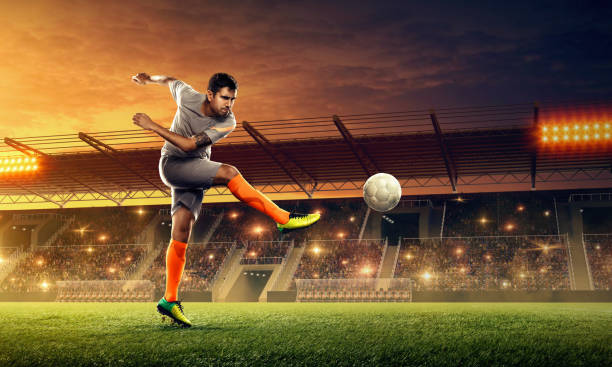 istock Soccer player in action on professional soccer stadium 1157318033