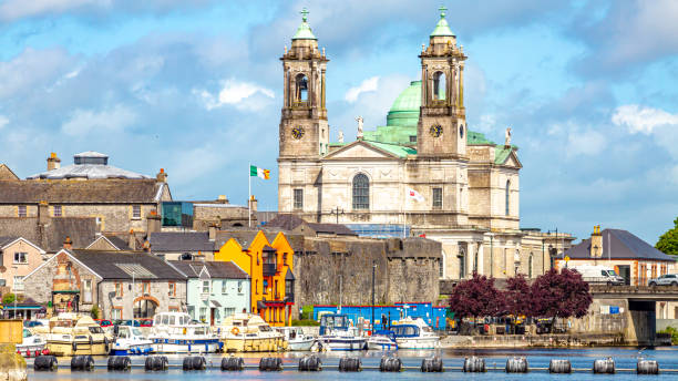Beautiful view of the parish church of Ss. Peter and Paul and the castle in the town of Athlone next to the river Shannon stock photo