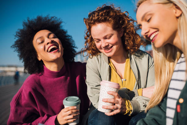 istock Girls drinking coffee 1157319147