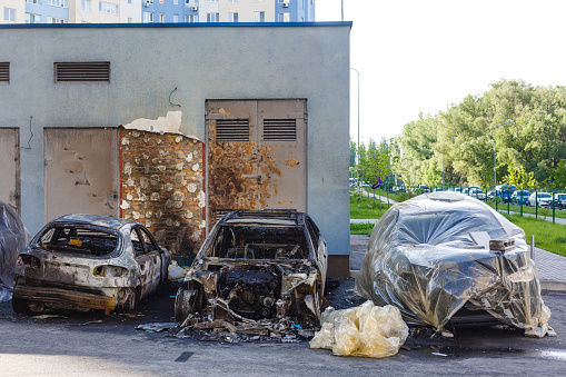 Burnt cars on the street in the cityBurning car Fire suddenly started engulfing all the car