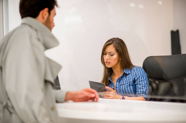 istock Man traveling doing a check-in at the airport 1157319653