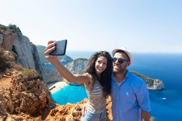 istock Couple taking selfie over Zakynthos island 1157319948