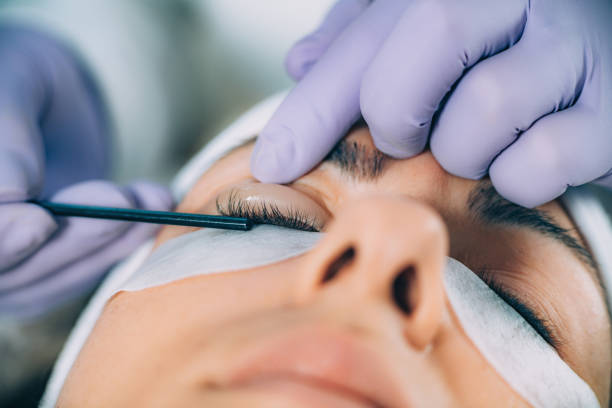 istock Cosmetologist Doing Lash Lifting 1157321296