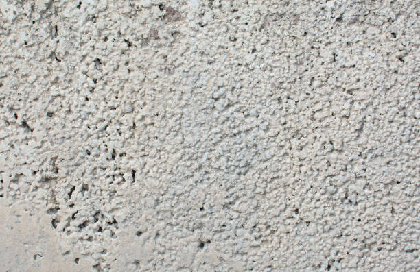 istock A lot of paint on the surface. Relief texture. Light background 1157321847