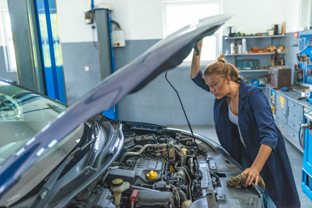 istock Auto mechanic working in garage 1157323592