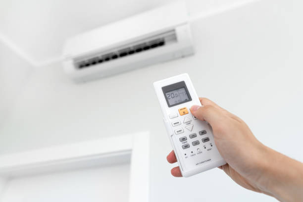 istock Air conditioner split on the wall inside the room 1157324452