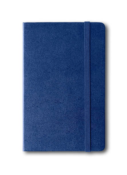 Marine blue closed notebook isolated on white Marine blue closed notebook mockup isolated on white moleskin stock pictures, royalty-free photos & images