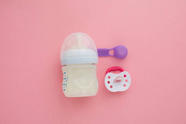 istock preparation of mixture baby feeding 1157327666