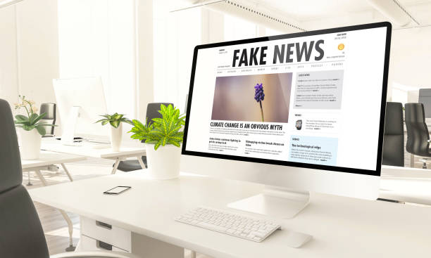 istock fake news computer in loft office 1157329699