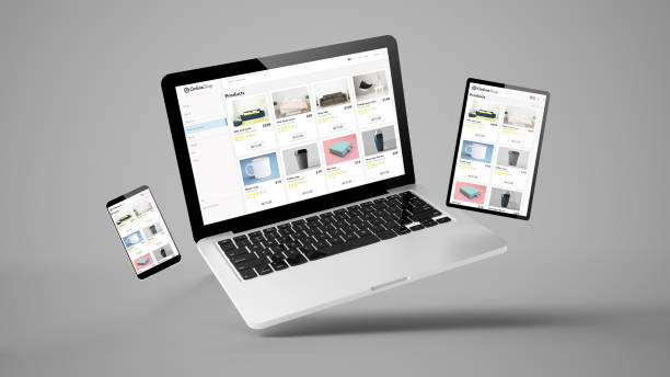 オンラインショップのウェブサイトを示すフライングタブレット、ラップトップ、携帯電話 - mobiles internet ストックフォトと画像