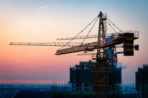 Construction site under sunset