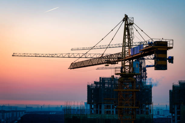 construction site under sunset - building development imagens e fotografias de stock