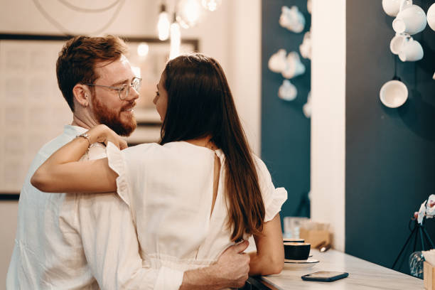 istock Loving couple in a coffee shop 1157334098