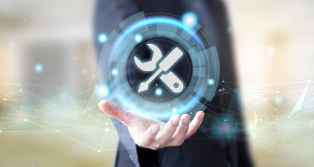 istock businessman with digital technology tools repair concept 1157335369