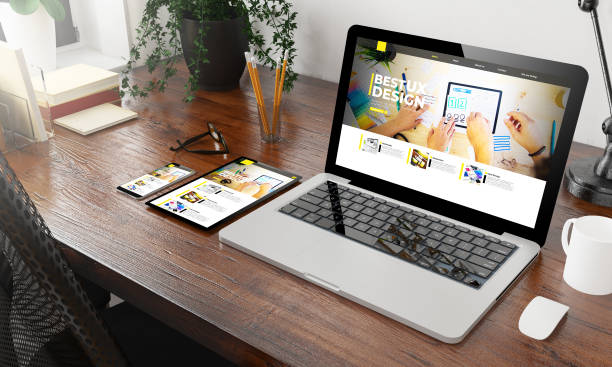 istock devices ux design website on wooden desktop 1157345573