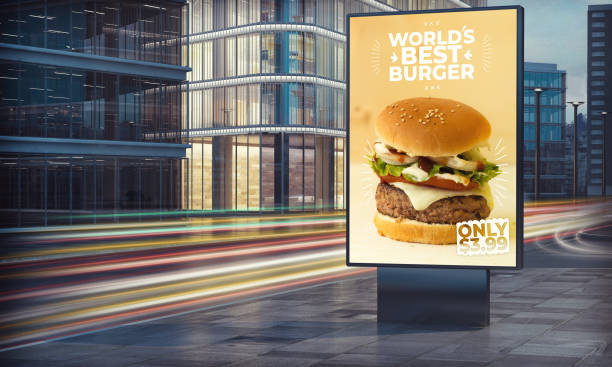 istock Advertising burger billboard in city night 1157345609