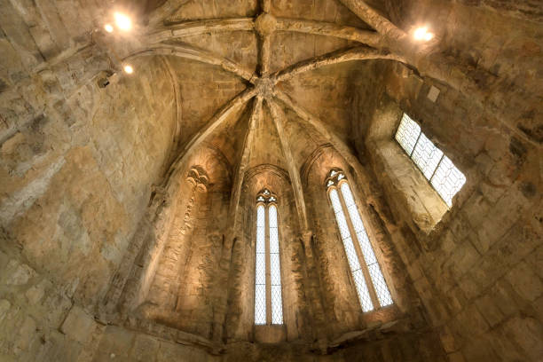 istock Windows and stone ceiling inside the ancient Gothic building of old church 1157346398