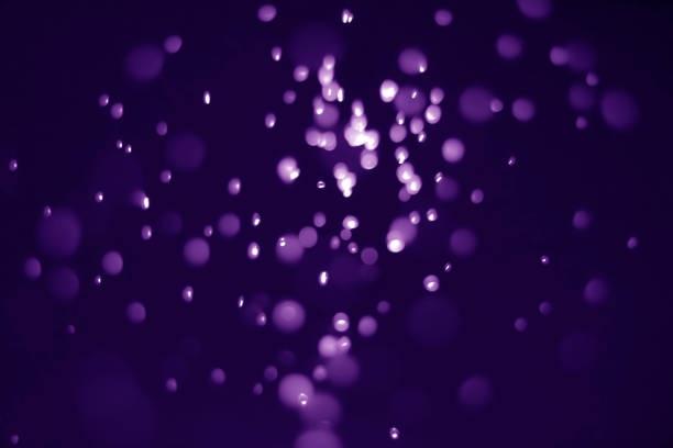 istock Bokeh purple proton background abstract 1157346552