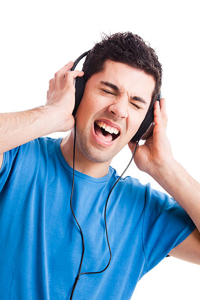 istock Young man listen music 115735117