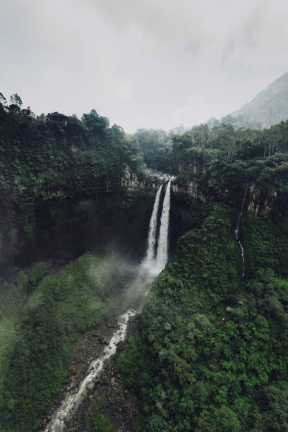 istock Scenic aerial view of Madakaripura waterfall on Java 1157353567