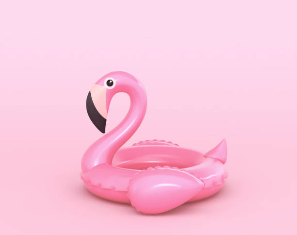 istock Inflatable flamingo on pink background 1157353573