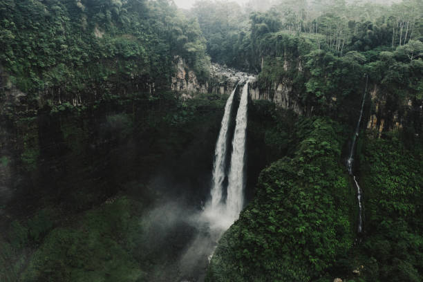 istock Scenic aerial view of Madakaripura waterfall on Java 1157353705