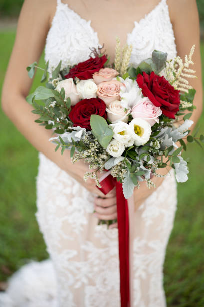 istock Bride with flower bouquet 1157358390