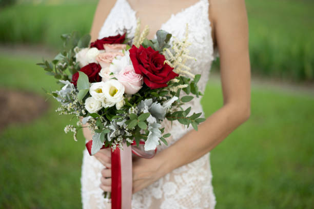 istock Bride with flower bouquet 1157358427
