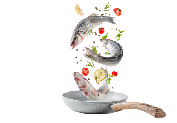 istock Raw sea bass fish with spices 1157359970