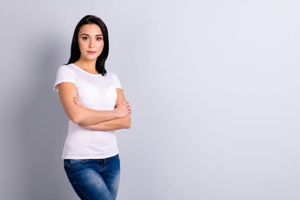 istock Portrait of her she nice-looking attractive lovely winsome content experienced successful girl lecturer professor folded arms isolated over light gray background 1157360065