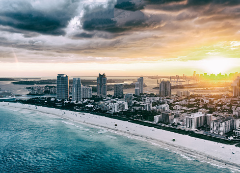Stunning aerial view of South Beach with a wonderful sunset. Oceanfront waterfront. Amazing skyline. Miami Beach. Florida.
