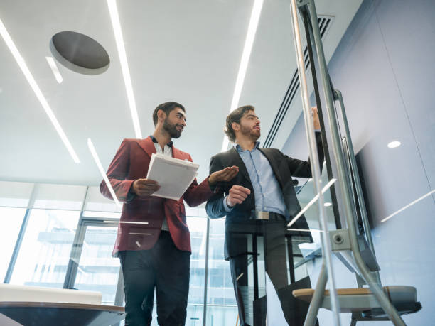 istock Concentrated businessmen working 1157362250