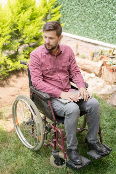 istock Disabled man in wheelchair 1157362666