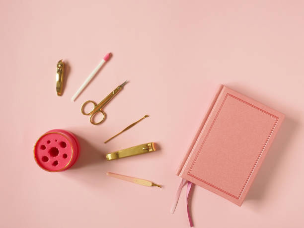 istock Manicure set for nail care on pink background. 1157364167