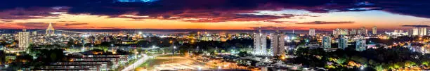 Panoramic landscape in long exposure of Manaus in the evening, showing the Rio Negro bridge, famous tourist spot